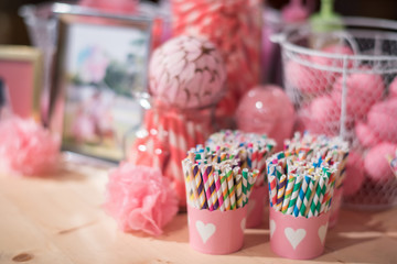 Decoration : select focus at colorful straws paper in pink cup. variety decoration in romance design theme background.