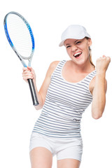 The winning female tennis player is happy on a white background