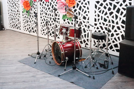 Drum kit in hall for wedding or other event with decorations