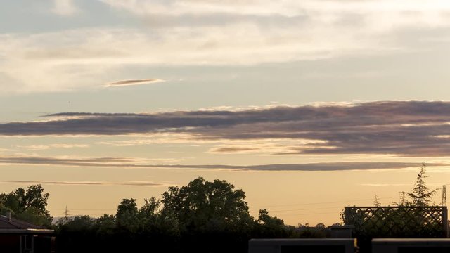 4K Timelapse Warm Clouds at Sunset Parma Italy