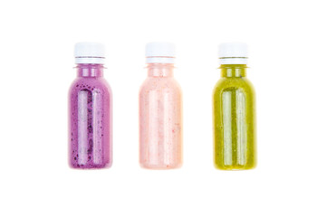 Three types of smoothies in plastic bottles