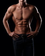 Fototapeta na wymiar Muscular torso of male model