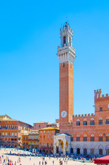 Obraz premium Piazza del Campo with Torre del Mangia, aka Tower of the Eater, in historic center of Siena, Tuscany region, Italy, Europe.