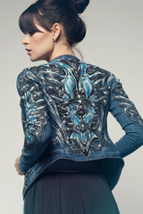 Model in a stylish skirt and jacket 