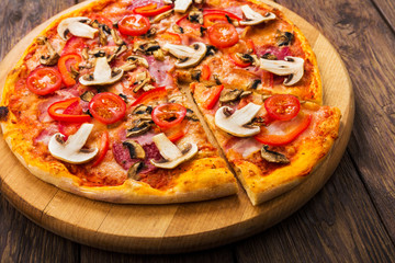 Delicious pizza with mushrooms and pepperoni