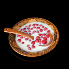 Ripe strawberry with milk in a bowl and spoon