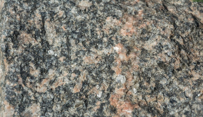 Wall from granite close up. A background for an object