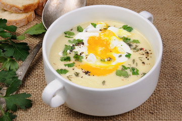 potato cream soup with poached eggs