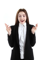 Portrait of happy nice schoolgirl teenager in white shirt on gray background, studio