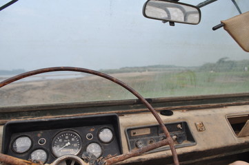 Obraz premium The Dashboard of a Very Old Jeep
