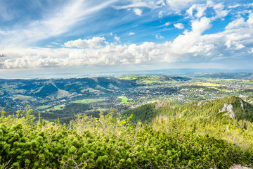 Panorama of mountains valley, view of Zakopane from the top of mountain, Tatry, Poland