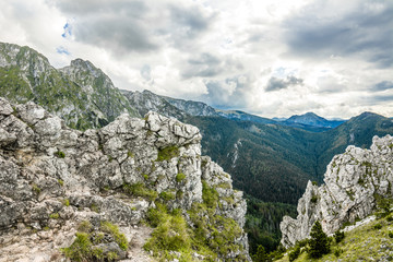 Panoramic mountain landscape, top with rocks..