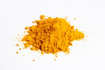 Heap of turmeric. Isolated on white.