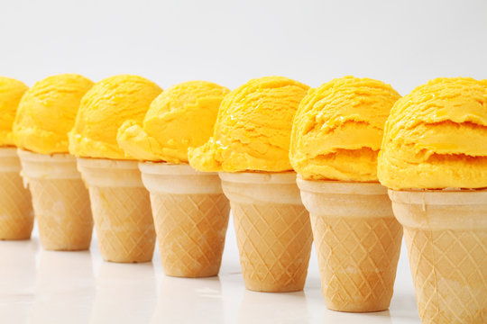 Yellow Ice Cream Cones In A Row