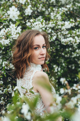 Fototapeta premium Red-haired girl in cherry