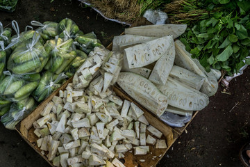 slices of young jackfruit and cucumber on sale in traditional market photo taken in Bogor Indonesia