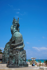 Fototapeta na wymiar Famous Mermaid Statue at public beach in Mermaid Statue at Public Beach in Playa del Carmen / Fundadores Park in Playa del Carmen in Mexico