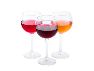 Red, white and rose wine glasses up on white isolated