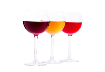Red, white and rose wine glasses up on white isolated