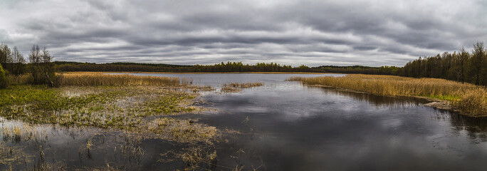 Spring river and sky panorama
