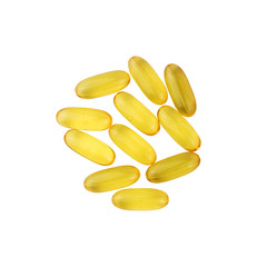 Yellow capsules omega 3, fatty acid, fish oil isolated on white background, top view