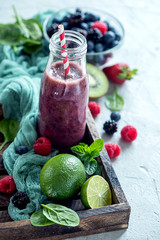 Berry smoothie, healthy detox drink, diet or vegan food concept, vitamins,