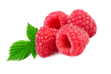 Isolated raspberries. Fresh raspberry with leaf isolated on white background