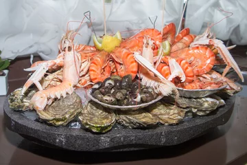 Foto auf Acrylglas Meeresfrüchte Fischgericht in einem Restaurant
