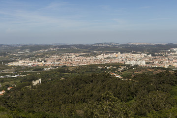 Fototapeta na wymiar Panoramic view of a beautiful city in Portugal. Blue sky. Holidays and travelling. Sunny weather.