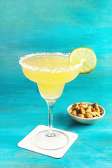 Margarita cocktail photo on vibrant background with copyspace