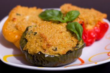 Colorful peppers with couscous on a plate