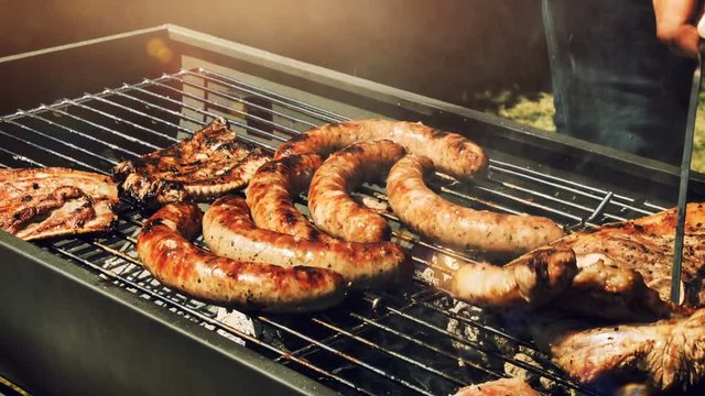 Meat cooking on barbecue grill for summer outdoor party, 4k