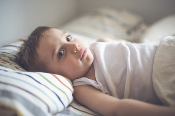 Young Boy on bed