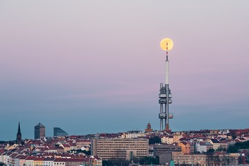 Prague skyline with full moon
