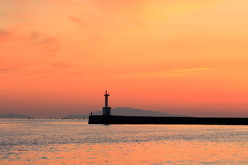 Sunset, Lighthouse and Angler