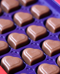 Obraz na płótnie Canvas Chocolate hearts , close up
