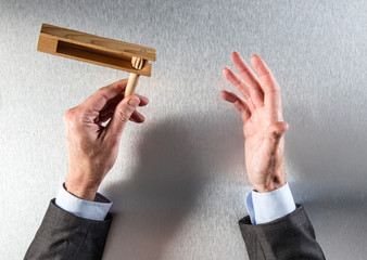 businessman's hand gesture for concept of noisemaking and communication