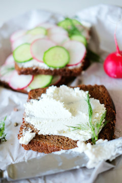 Healthy vegetarian sandwiches with radish and cucumber slice