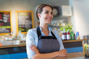 Woman working in coffee shop
