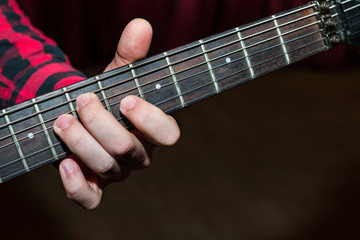 Fototapeta na wymiar Close up of guitarist