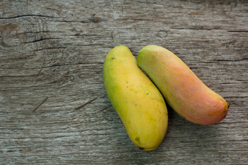 Mangoes on the wooden floor