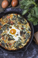 Frittata with potatoes, nettles and pepper