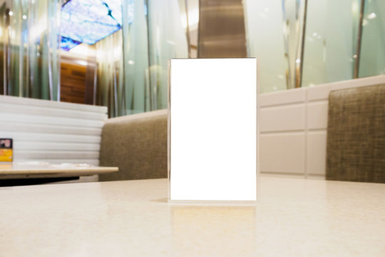 Blank Menu frame on Table in cafe restaurant