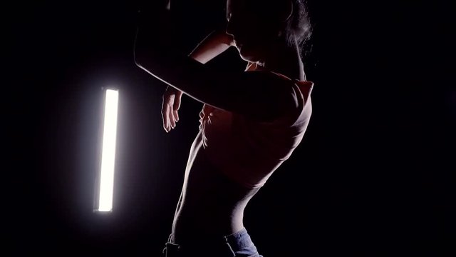 Silhouette dancing in the dark girls