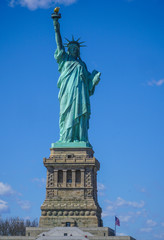 Obraz premium The Statue of Liberty in New York- MANHATTAN / NEW YORK - APRIL 1, 2017