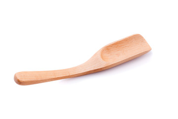 Wooden spoon on a white background
