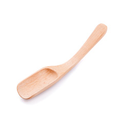 Wooden spoon on a white background