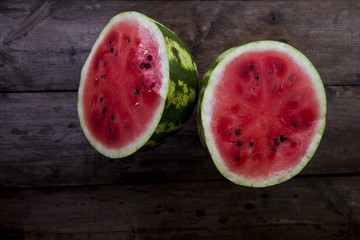 watermelon on a dark wooden background