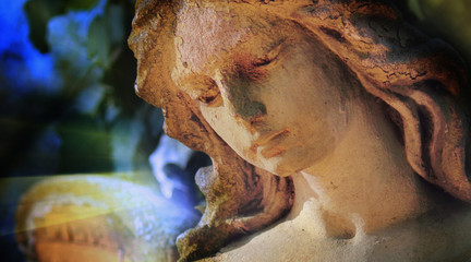 Majestic view of antique statue Guardian Angel in the sunlight (Religion, faith, holy, sin)....