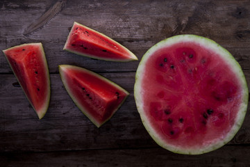 watermelon on a dark wooden background